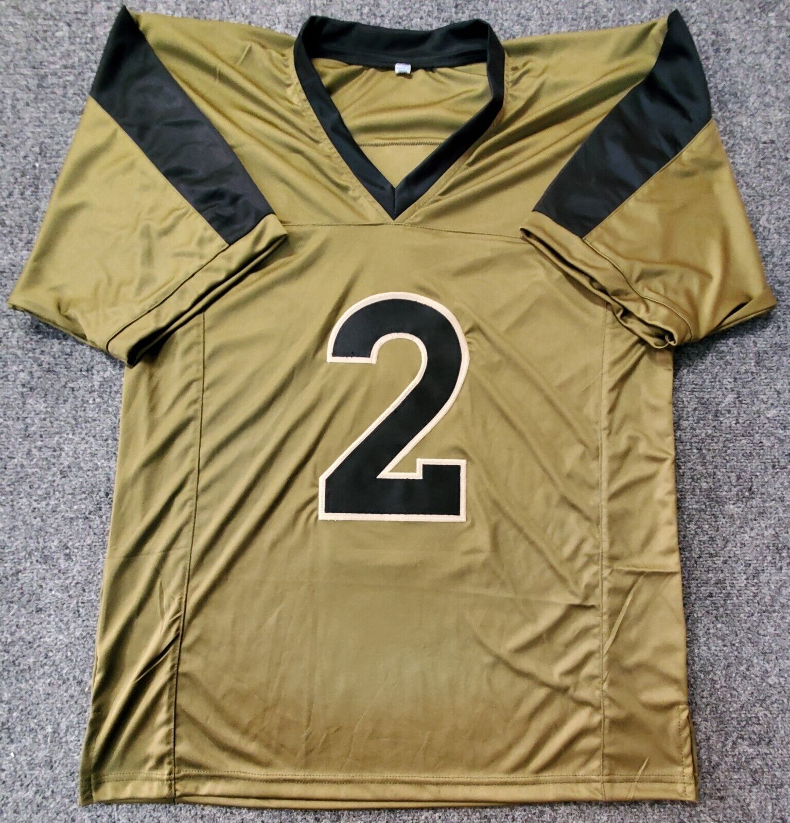 brown and yellow broncos jersey
