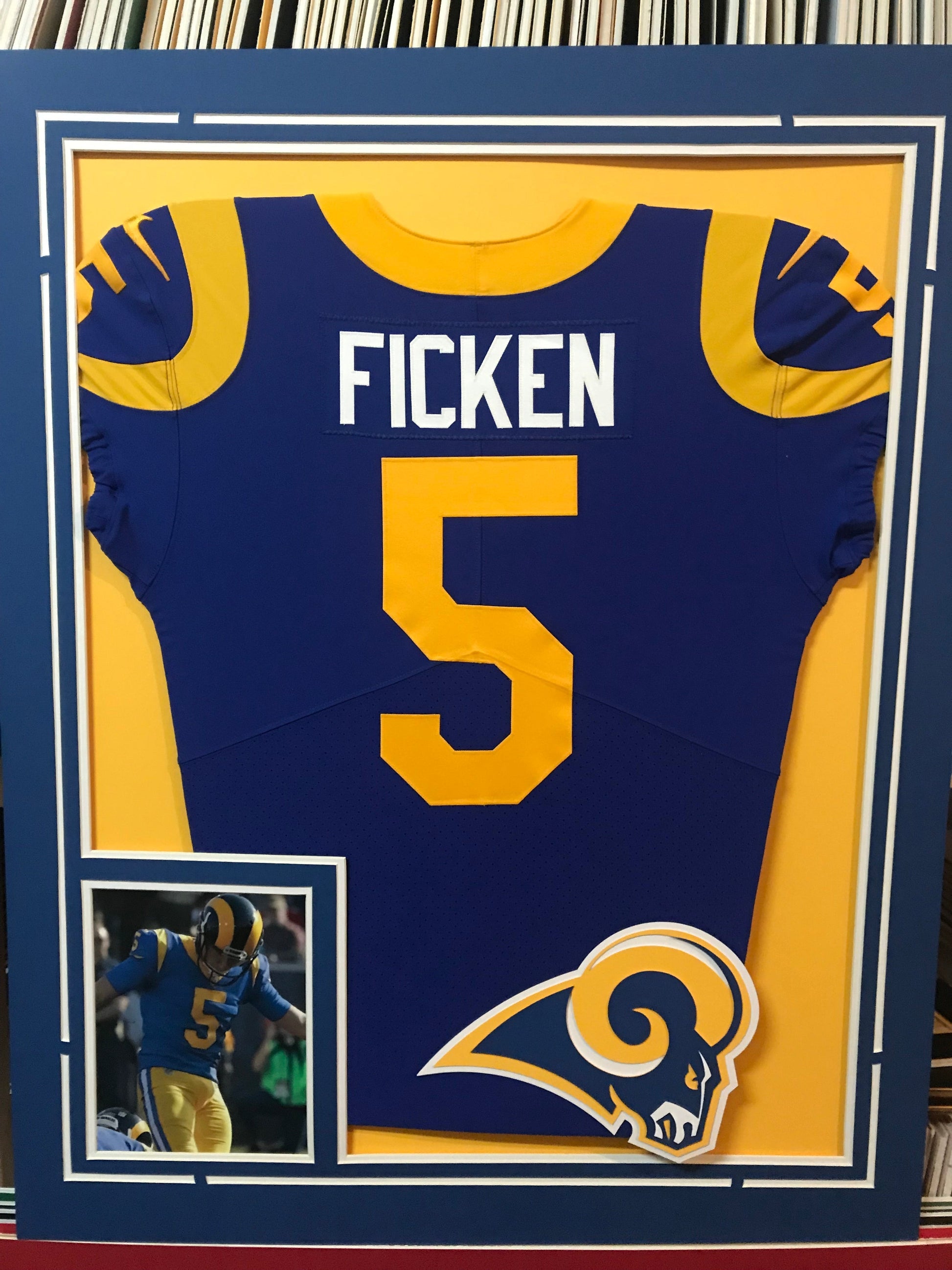 MVP Authentics - Framing Custom Framing - 1 photo vertical layout with floating logo and suede matting 225 sports jersey framing , jersey framing